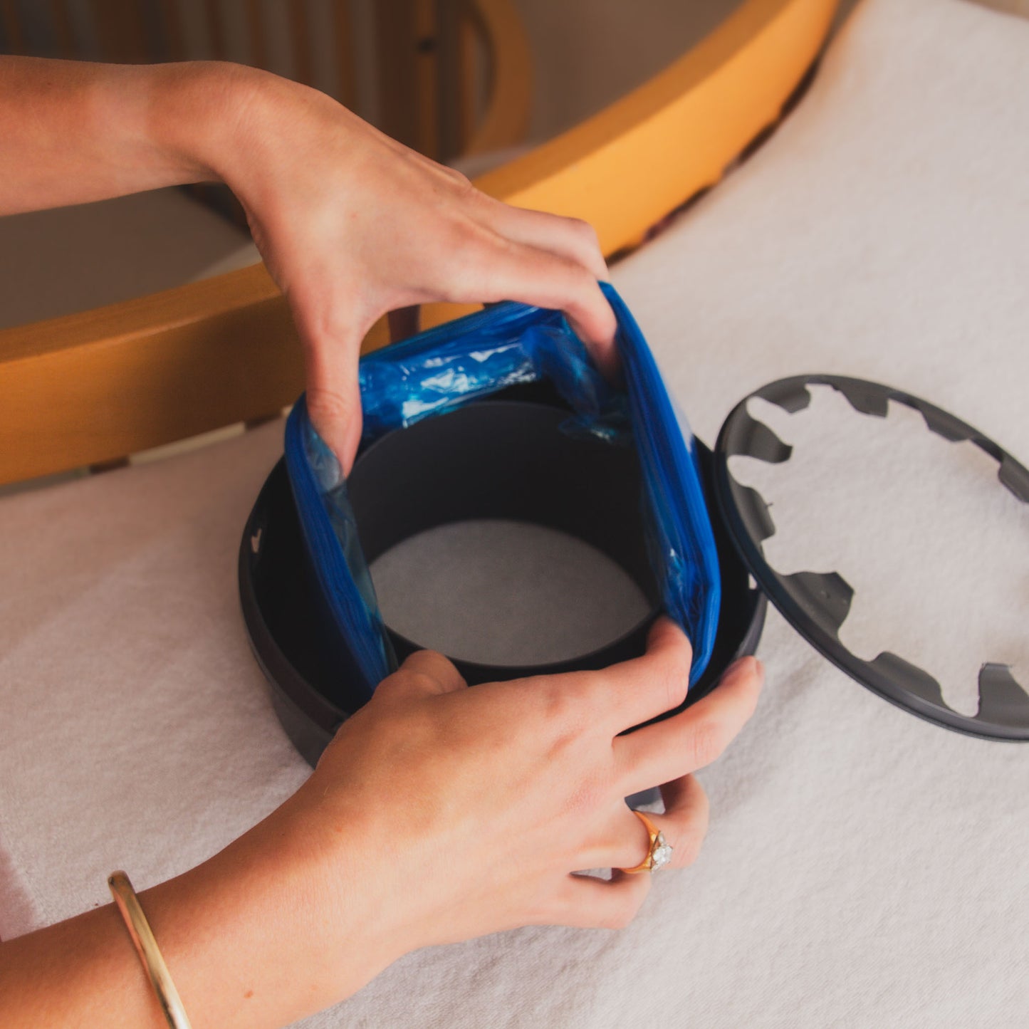 Bagroo Universal Refill Roll placed inside a Tommee Tippee Nappy Bin